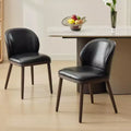 Two-piece dining chair set, upholstered seats, wooden legs, ergonomic design, 265 lbs weight capacity, suitable for dining rooms.