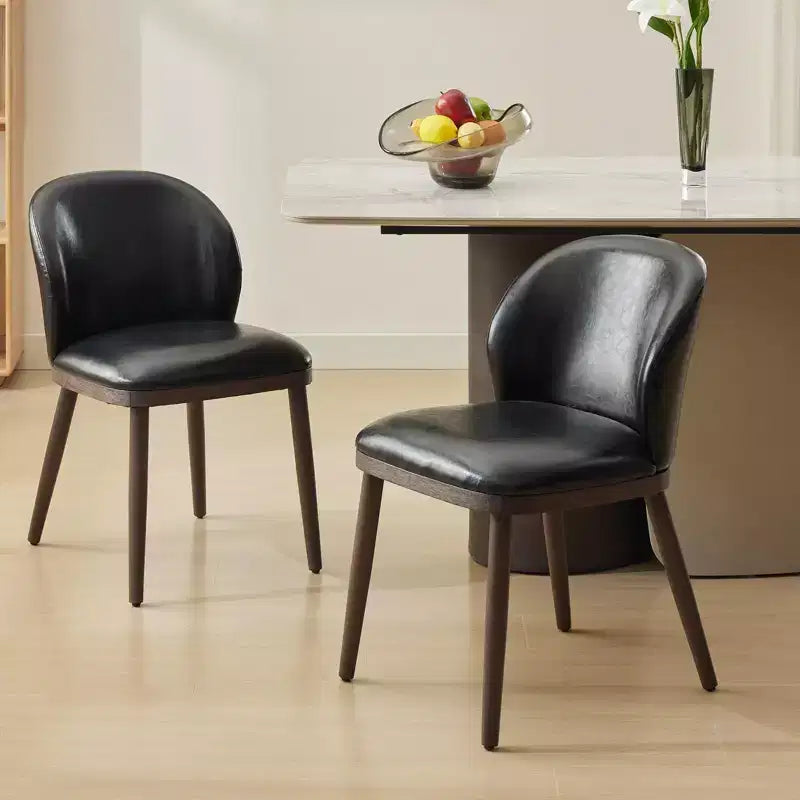 Two-piece dining chair set, upholstered seats, wooden legs, ergonomic design, 265 lbs weight capacity, suitable for dining rooms.