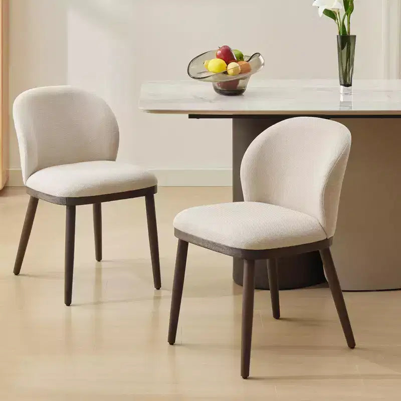 Two-piece dining chair set, upholstered seats, wooden legs, ergonomic design, 265 lbs weight capacity, suitable for dining rooms.